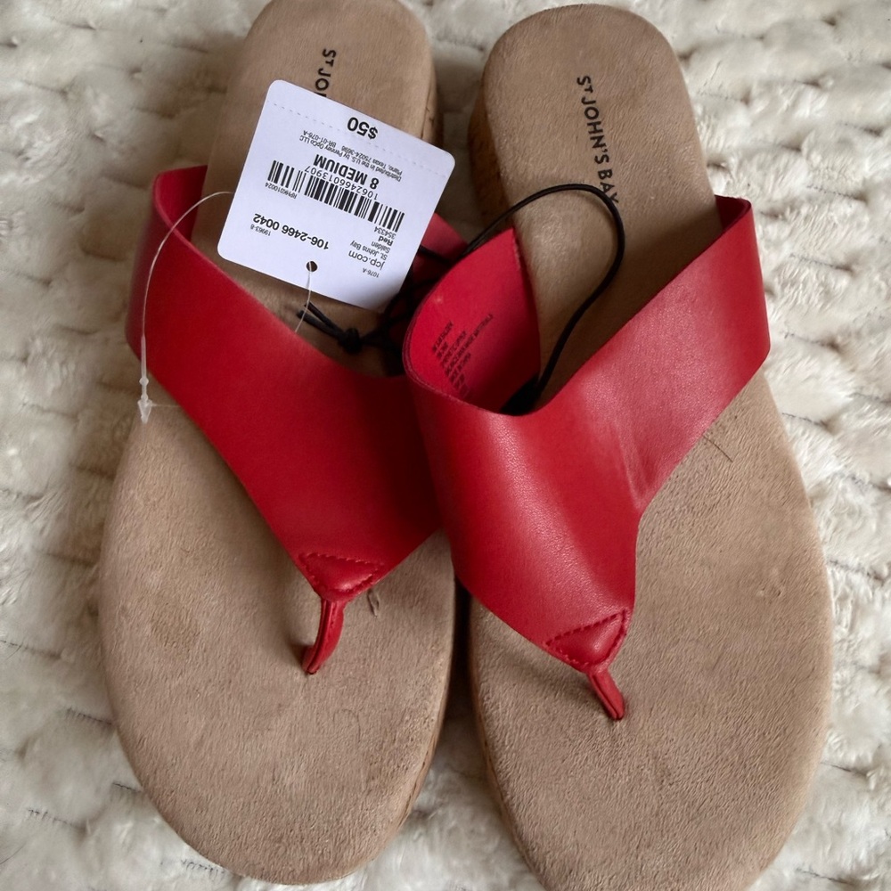 Woman’s red flip flops size 8 NWT